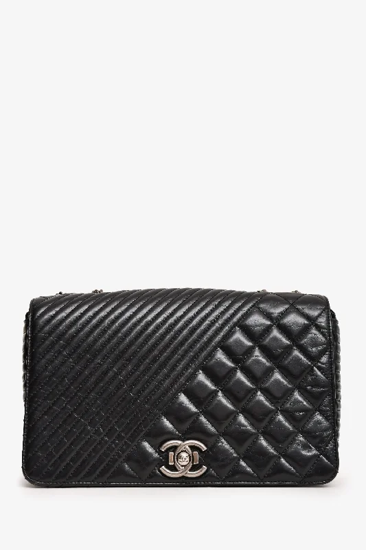Evening Elegance Pre-Loved Chanel™ 2014 Black Glazed Leather Coco Boy Flap Bag