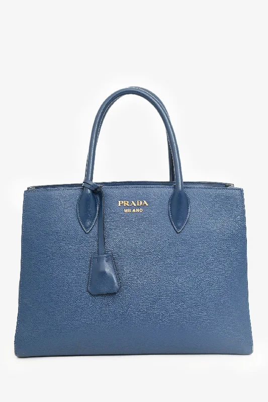 Timeless Elegance Redefined Prada Navy Saffiano Leather Bibliothèque Handle Bag with Strap